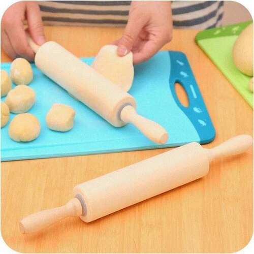 A large wooden roller rolling pin roll rod surfacXe wooden
