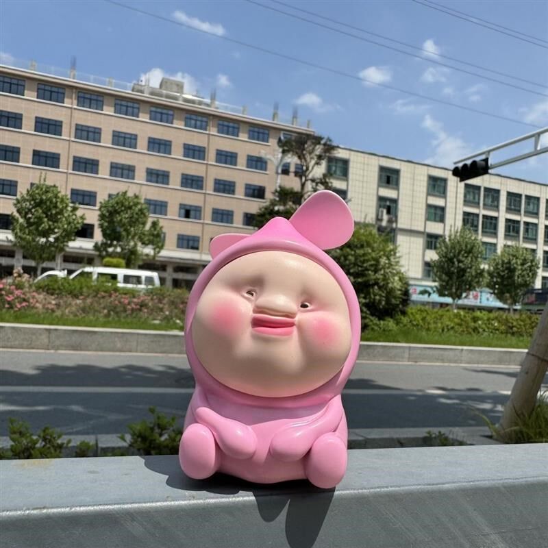 屁桃可爱造型风扇一歪嘴笑可爱卡通公仔解压捏捏手持式迷你电风扇