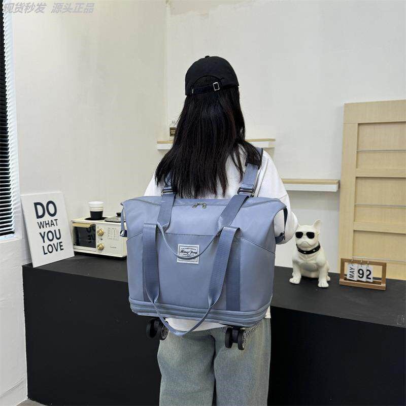带轮子滑轮万向轮的折叠行李袋可背拉双肩背包带拉杆旅行包健身包