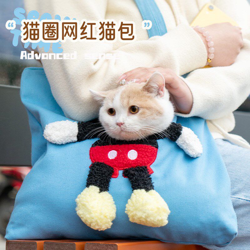 猫咪挎包单肩手拎猫包漏头v英短可爱狗狗帆布小包轻便宠物外出揹