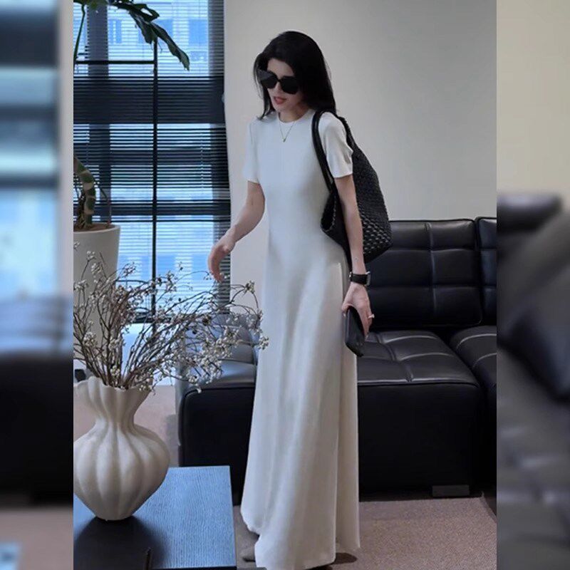 极简风气质纯色修身连衣裙女装2025夏季新款显瘦独特漂亮掐腰长裙