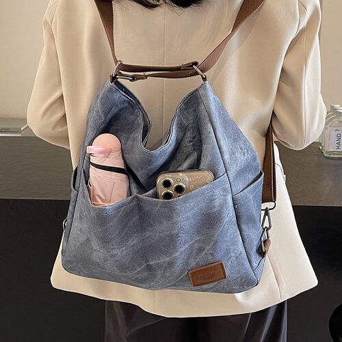 高级感包包女士2024新款双肩包质感单肩包大容量多用通勤水桶大包