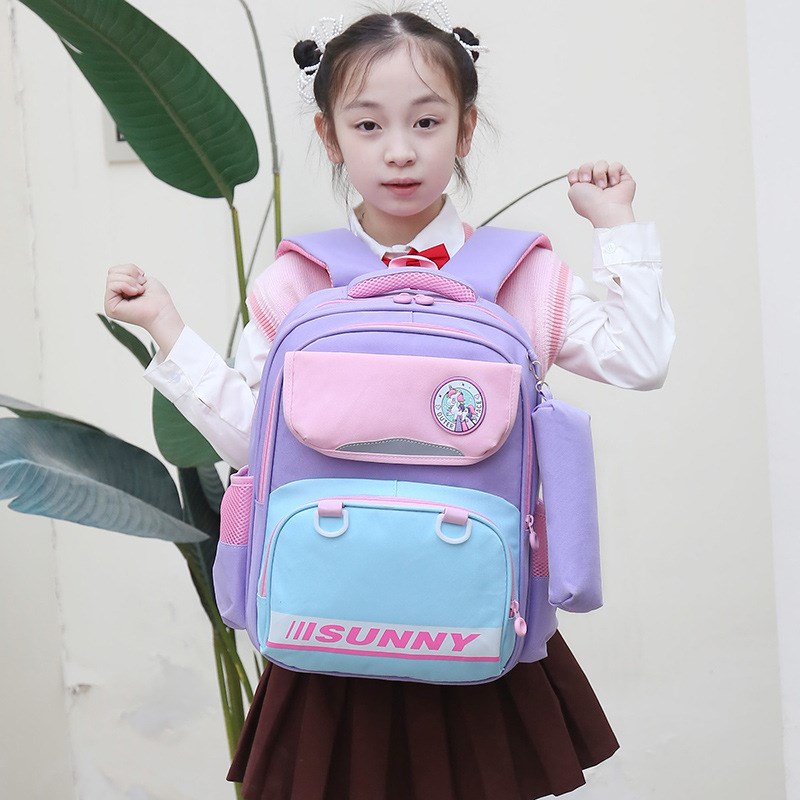 新款儿童书包小学生一二三年级男女孩可爱卡通送笔袋双肩背包外贸