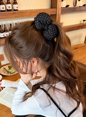 韩系黑色波点香蕉夹充棉蝴蝶结女