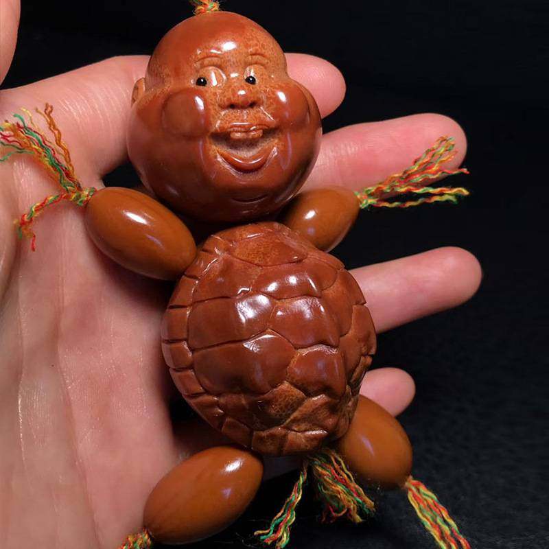 橄榄核雕新款手把件盘盘乐巴西橄榄核百态文玩把件富甲核雕捏捏乐