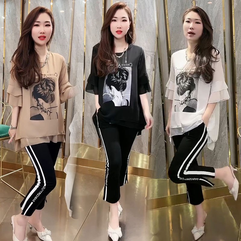 网红时尚套装女2023夏新款荷叶边印花中长款上衣七分裤显瘦两件套