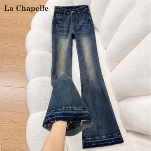 拉夏贝尔美式复古加绒微喇牛仔裤女秋冬季高腰修身辣妹毛边喇叭裤