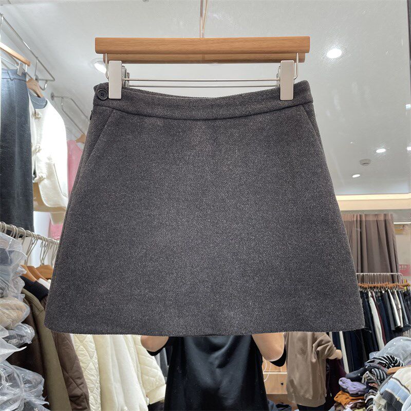 8090服饰24930冬季韩版高腰侧拉链纽扣设计防走光A字毛呢半身裙女