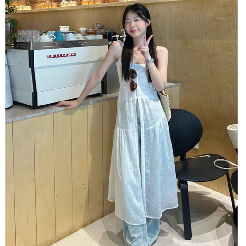 新款美式叠穿氛围感女生夏季2025中长款白色高端沙滩吊带连衣裙子