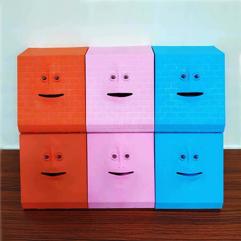 人脸自动吃钱存钱罐可爱平砖面猴脸感应电动表情包储钱罐日本周边