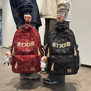 2025新款书包男女生初中生高中大学生情侣印花背包旅行红色双肩包