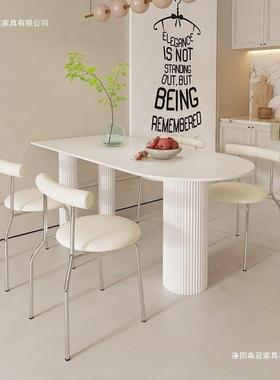 奶油风纯白色岩板餐桌用餐椅组合现代简UTP小约户型家形半圆吃饭