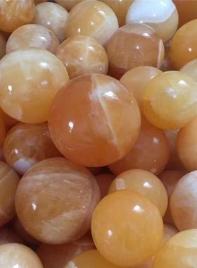 热JWH卖天然饰水晶球黄色石解石摆件晶洞打磨圆球摆件装方品