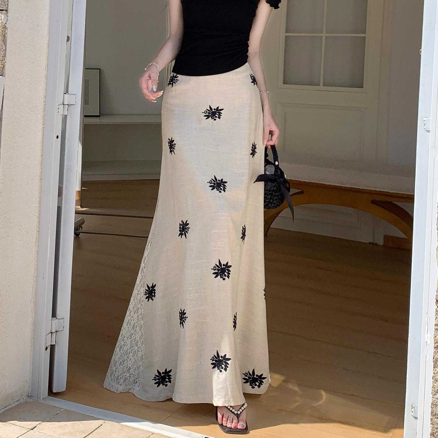 亚麻刺绣蕾丝拼接半身裙女2026夏新款a字中长款设计感裙子