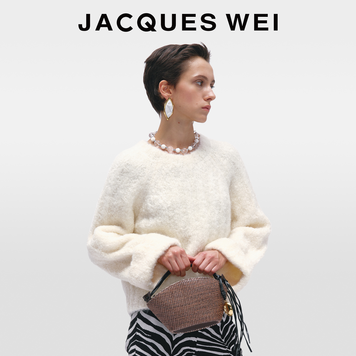 JACQUES WEI2025年新款棕色真皮流苏草编包女款小巧化妆包手拿包