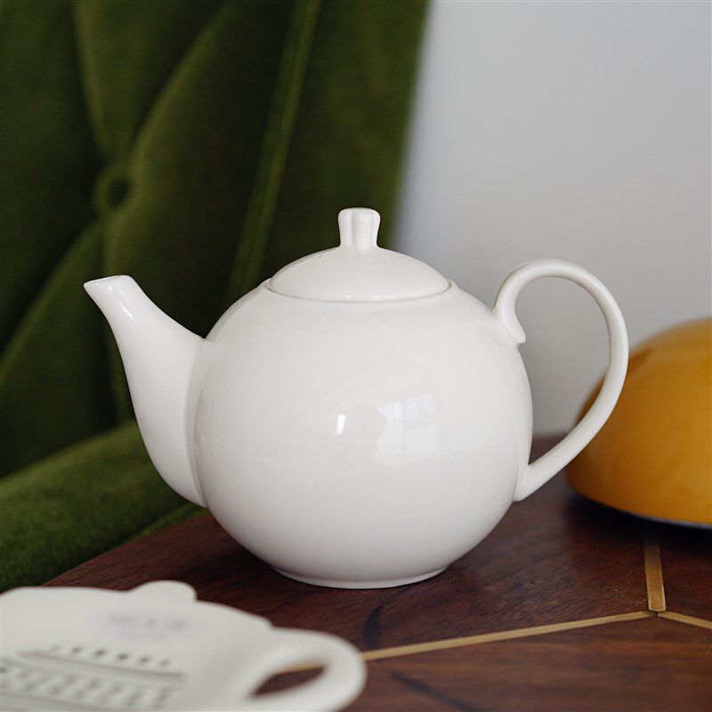 外贸圆形陶瓷白色茶壶简约英式下午茶壶球形耐高温凉水壶泡茶壶
