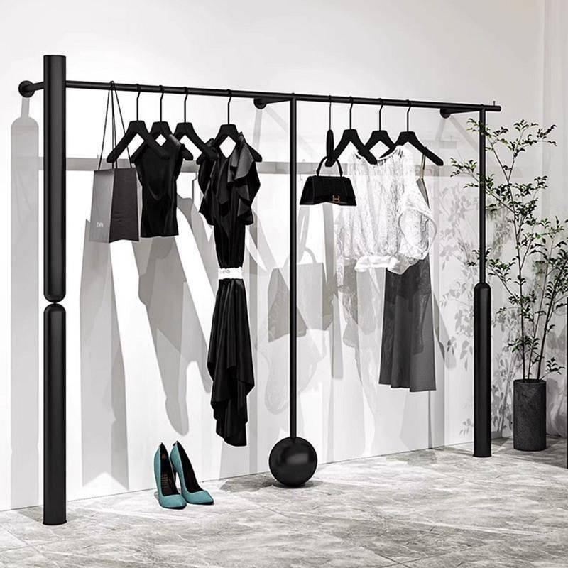网红男女墙上服装店展示架陈列架黑色装铁艺上墙挂衣架壁挂式货架