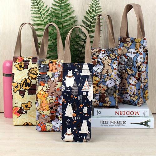 便携卡通手提水杯袋防水帆布焖烧壶杯套小拎包保温杯通用保护套子