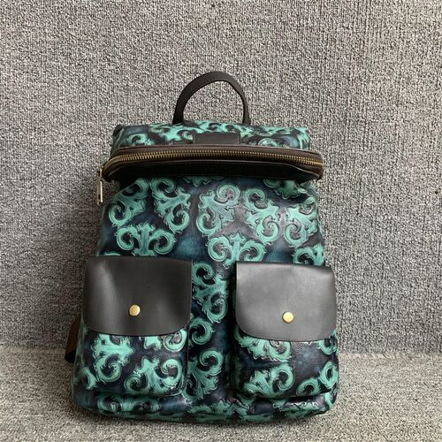 早春新品真皮背包小众复古头层牛皮撞色男女通用大容量双肩背包