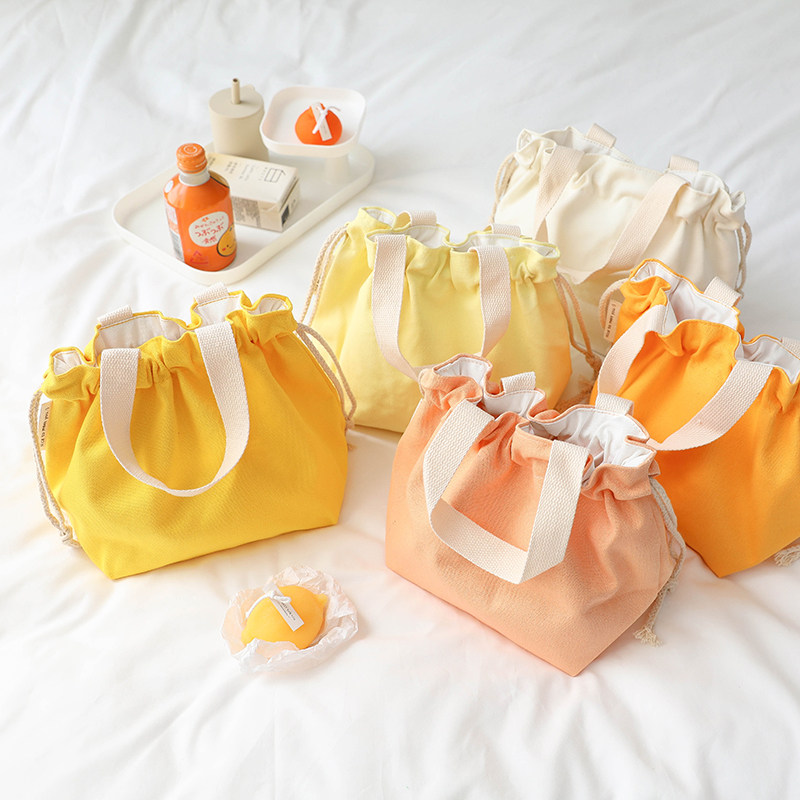 小清新夏日微甜 抽绳束口袋女大容量收纳纯色T帆布手拎便当包