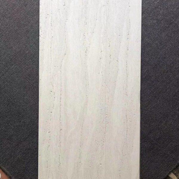 白黄色真洞洞石瓷砖600x1200客厅地砖玻化砖地板砖800x800背景墙