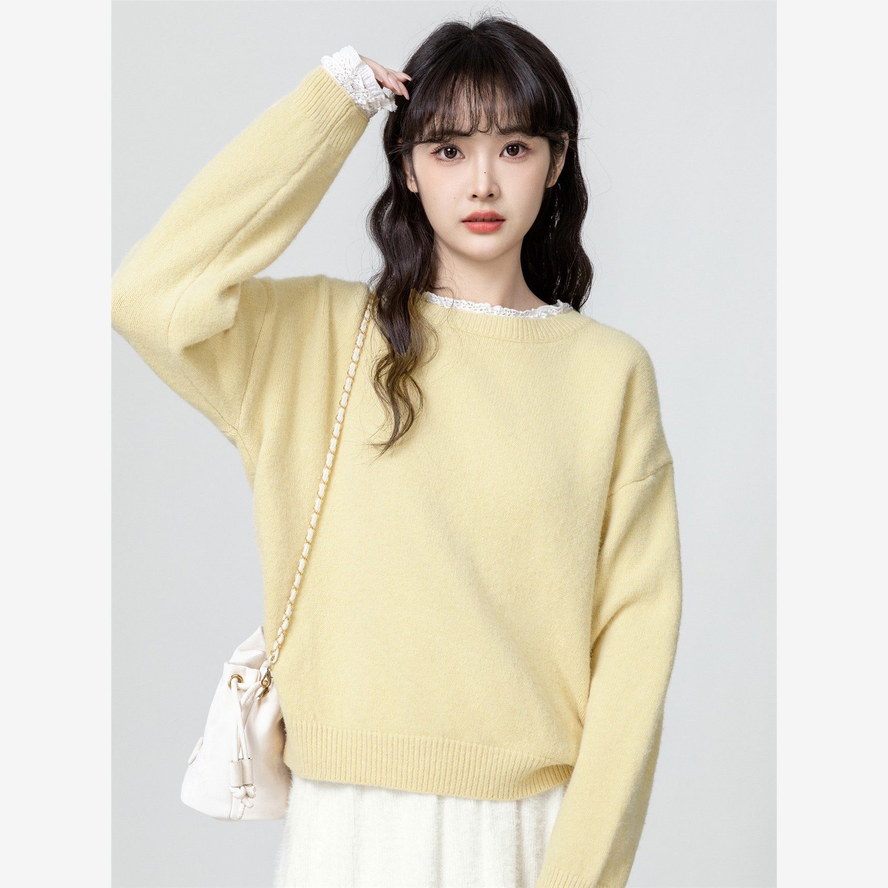 黄色圆领套头毛衣女秋冬2025秋季新款宽松加厚蕾丝拼接针织衫上衣
