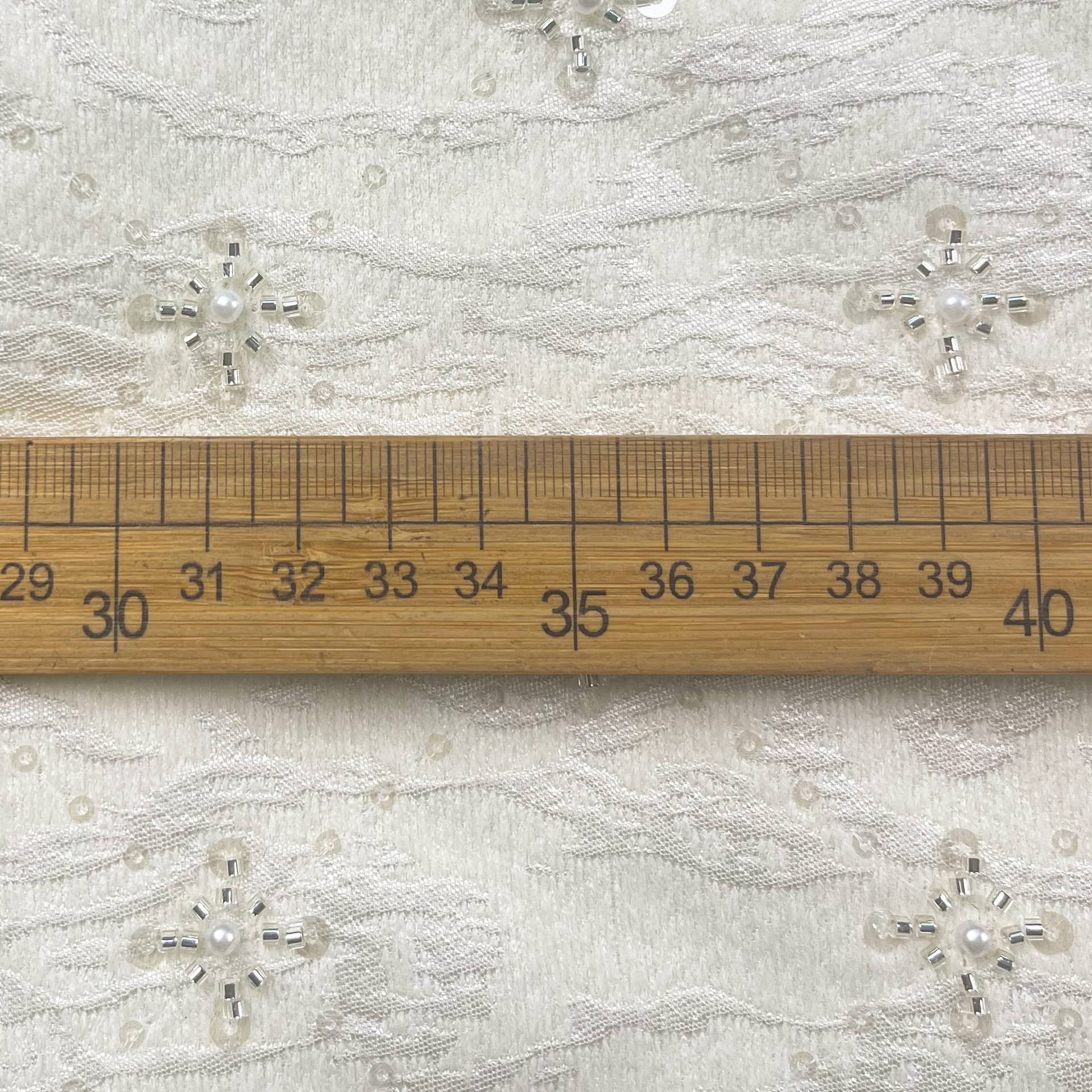 厂家现货提花呢亮片绣 冬季呢绒珠子绣花大衣面料