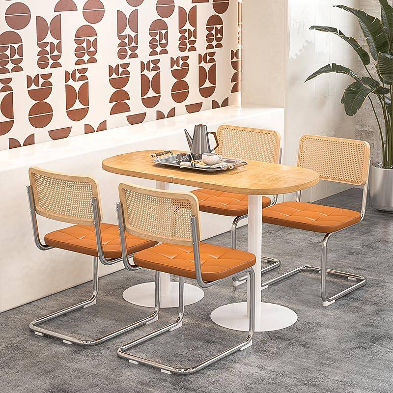 港式餐厅饭店藤编扶手椅不锈钢制脚餐饮店靠椅实木商用圆桌椅组合