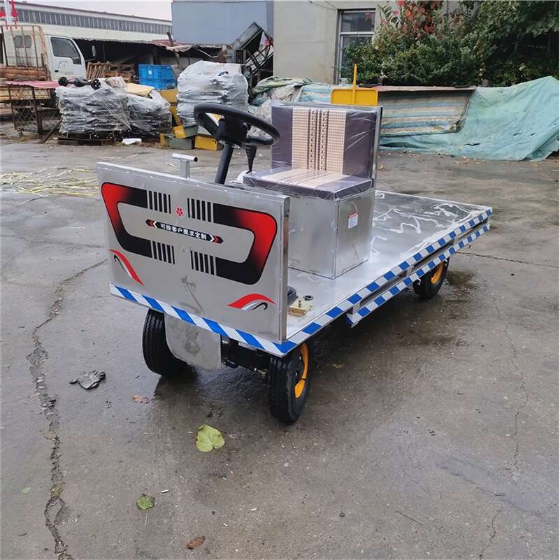 厂家供应白色方向盘座箱电动平板搬运车 方向盘式拉货车 电动板车