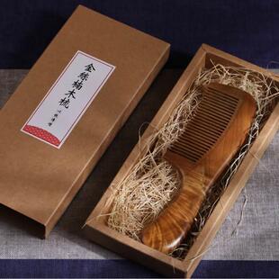 厂家四川雅安老料金丝楠木满水波木梳发梳头梳按摩梳实木梳子