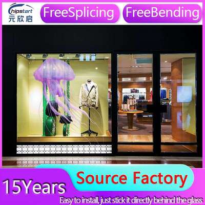 The holographic screen behind the glass curtain wall