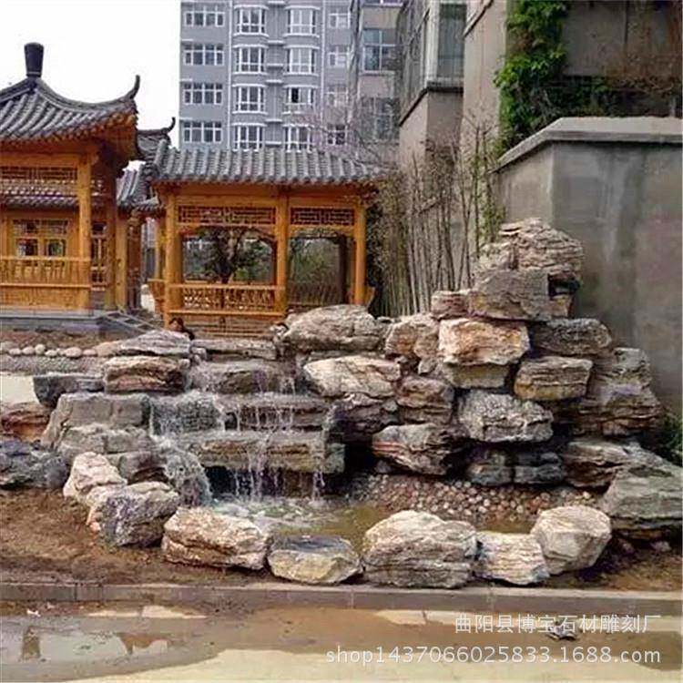 摆鱼上水石假山千层流水景观别313墅养池中间垒砌石石头组合雕塑