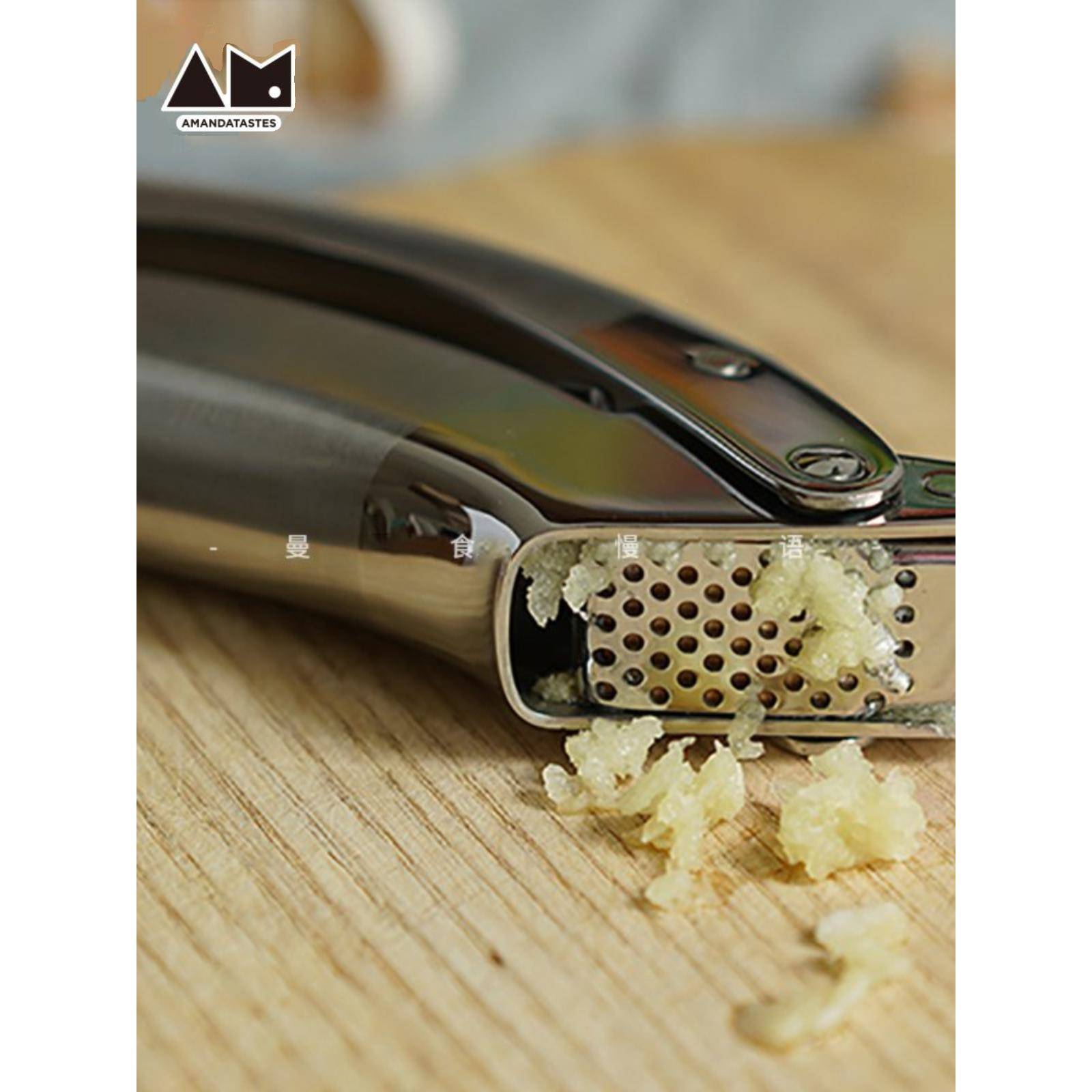 A6L泥曼慢语不F75H85HJ钢手动压蒜器家用蒜器搅蒜食锈器夹蒜蓉器