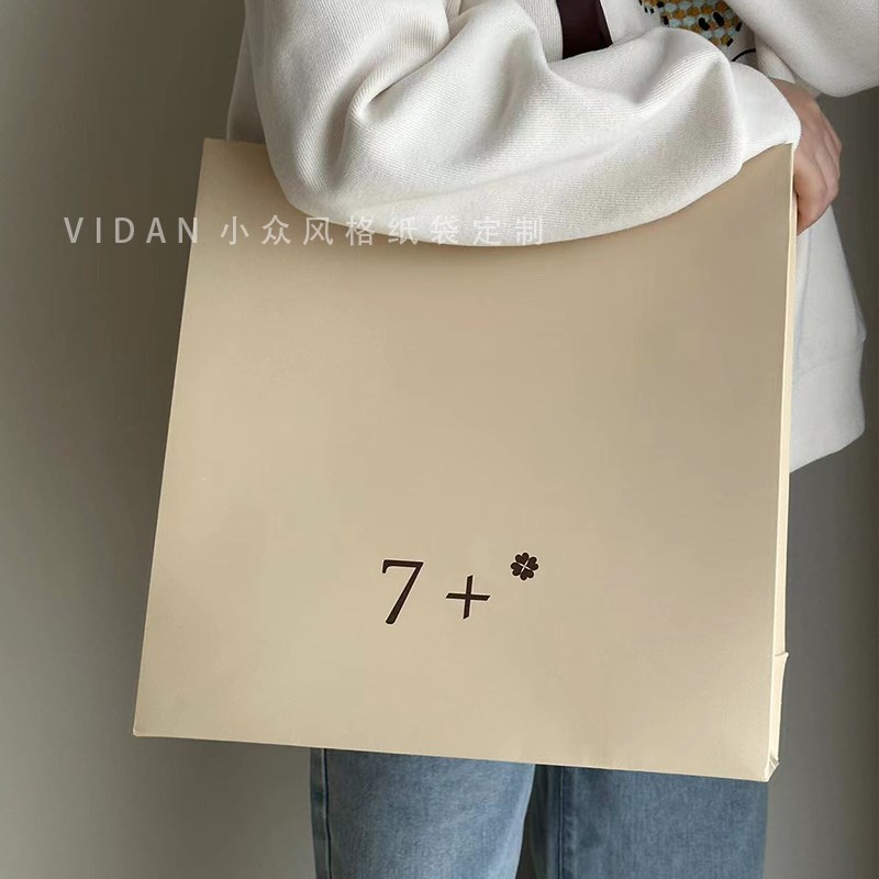 服装店纸袋定制米色购物袋印刷口袋订做男女服装店袋子定做手拎袋