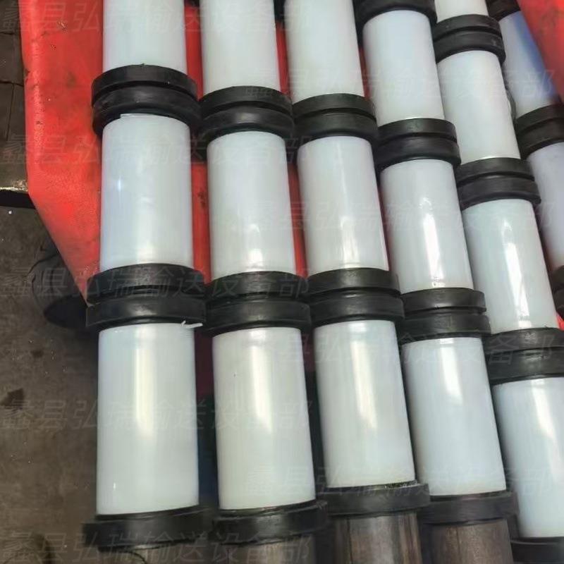 梳型滚圈托辊厂像家矿629用槽烤漆输送机无动力支架型缓冲筒输送图片