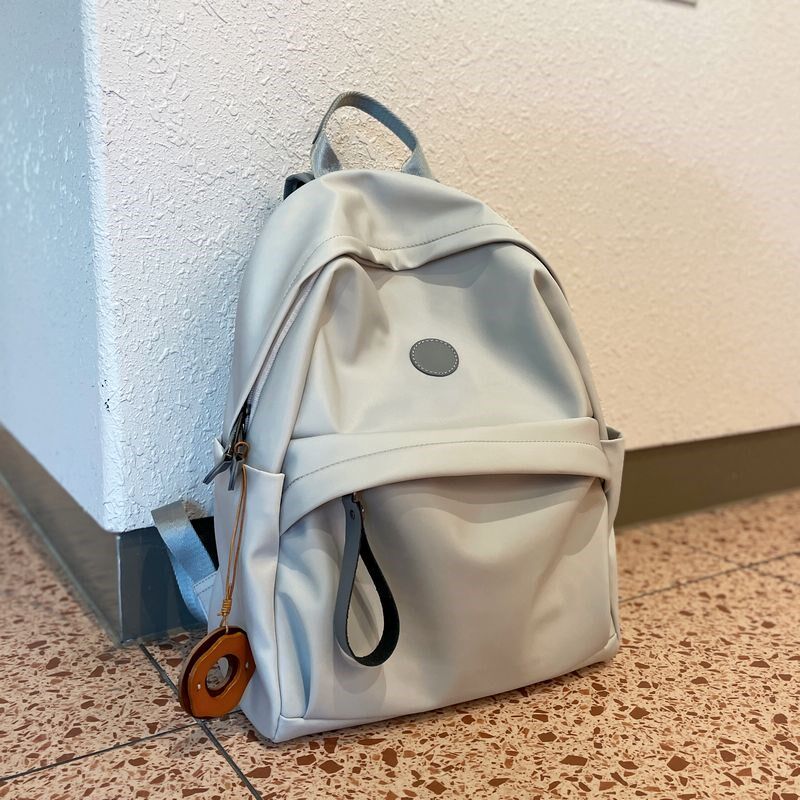 高颜值轻便旅游双肩包女2025新款牛津布女士背包超火外出登山包大