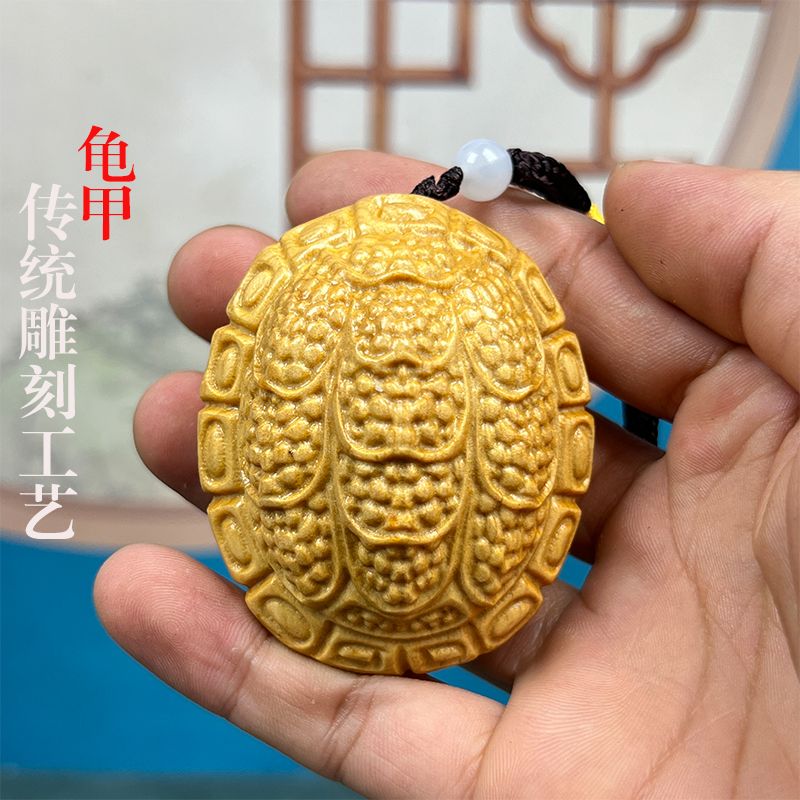 富甲天下崖柏木雕招财挂件图片