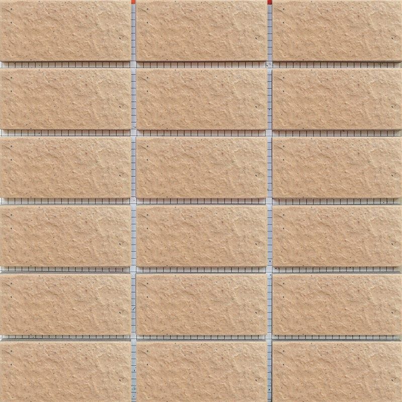 4595mm外墙砖纸皮砖彩码砖浅红色外墙瓷砖R带黑点麻面小区物业