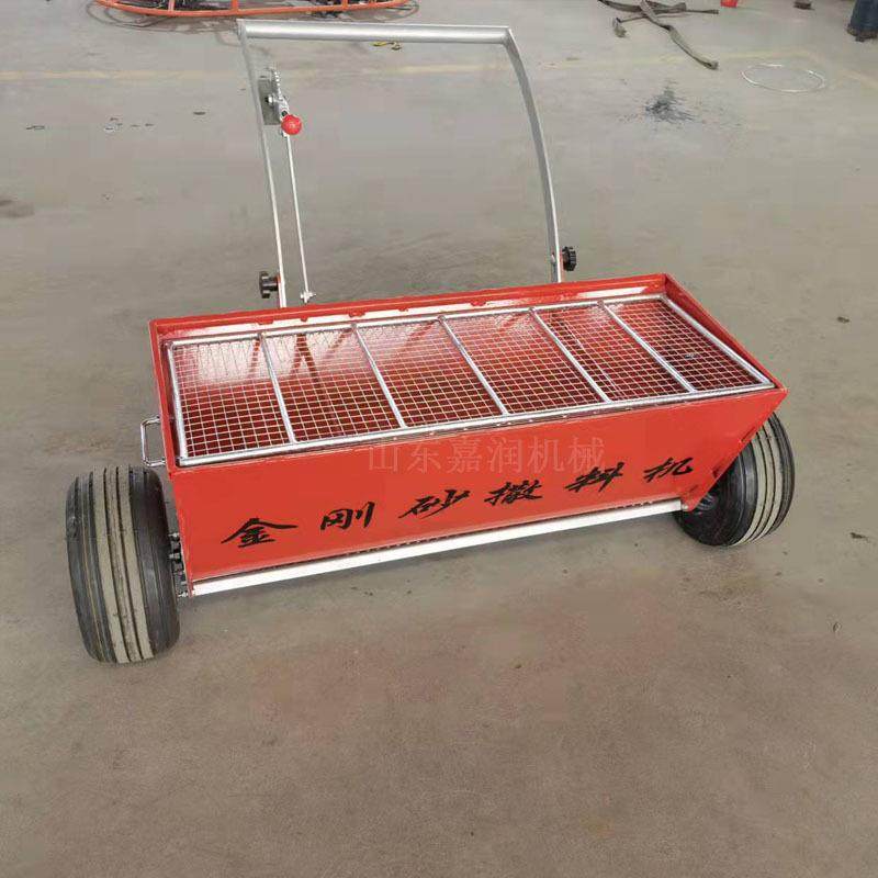 地坪施工金刚砂撒料机 厂房地面铺砂机 手推人力撒砂机