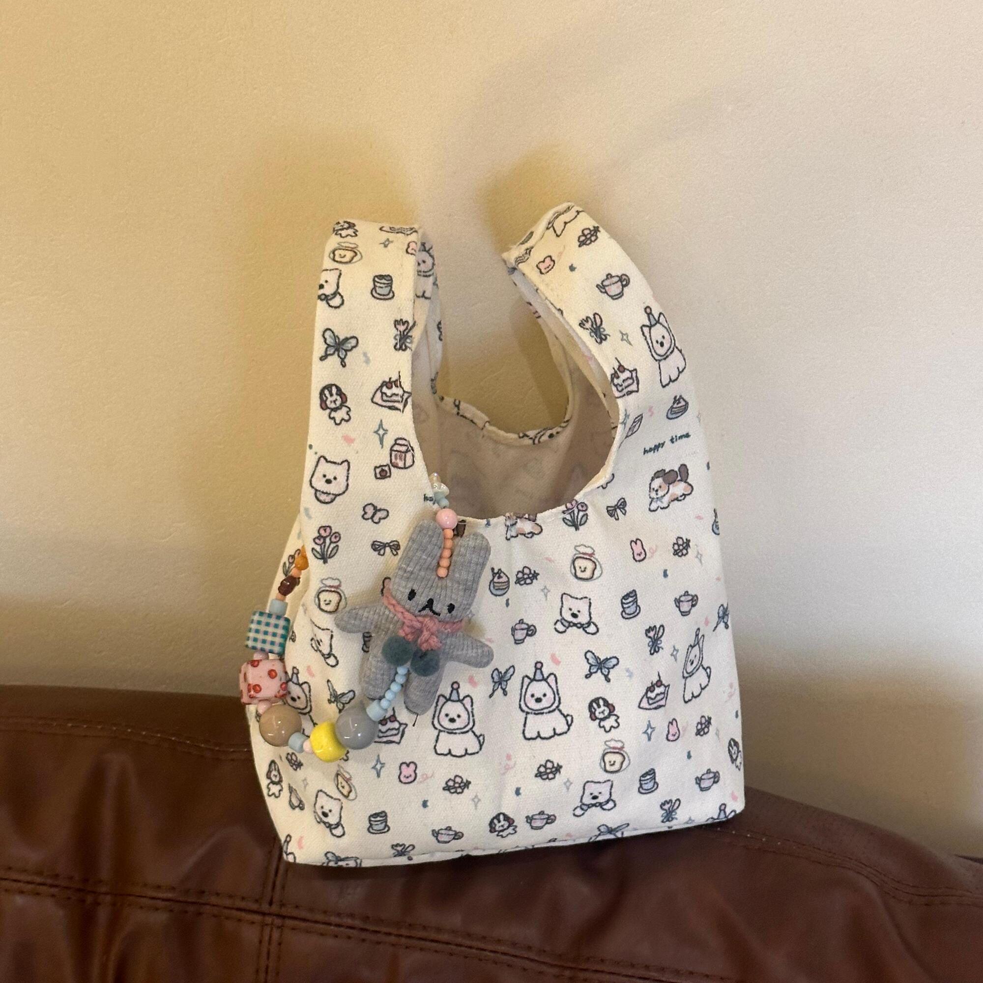 可爱狗狗帆布化妆包外出杂物手提饭盒袋便当包大容量便携手腕包女