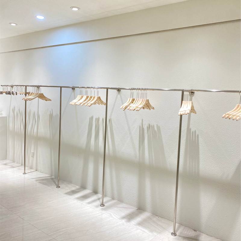 服装店上墙不锈钢展示架挂衣架子壁挂式女装店货架童装落地式挂杆
