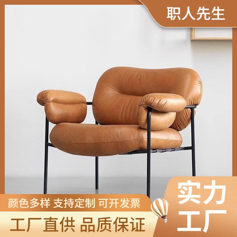 北欧设计师极简沙发椅意式轻奢皮革餐椅家用扶手现代简约洽谈椅