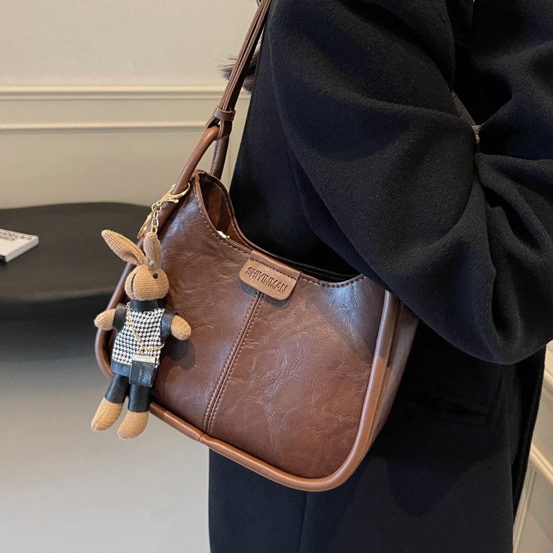 今年流行包包女式2024新款秋冬复古百搭斜挎包通勤单肩腋下水桶包,箱包皮具/热销女包/男包,通用款女包,淘宝优惠券,粉丝福利购,淘宝优惠卷