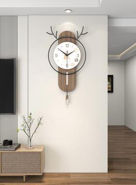 创意鹿头装饰挂钟现代简约家用静音时钟客厅玄关背景挂墙摇摆钟表