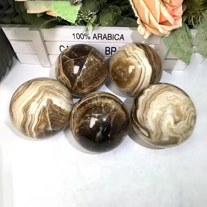 厂供天然琥珀球水晶球摆件黄色球家居办公风水摆件工艺品原石打磨