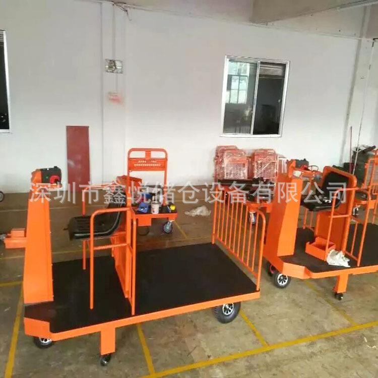 站驾式电动平板车带护栏式行李电驱平板车座驾式电动拖板车