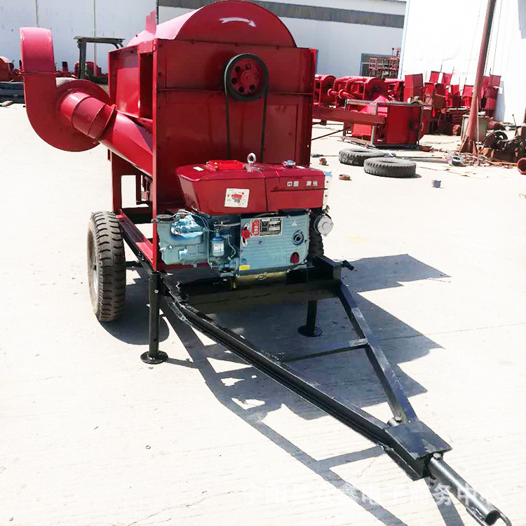 非洲冀脱粒机柴油机带动可加移动轮胎底架方便走动三个风机