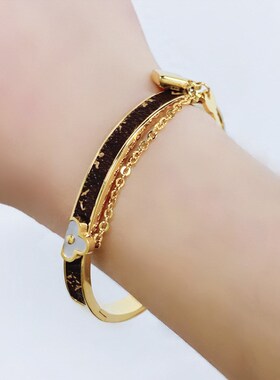 欧美风钛钢四叶花链条手镯皮质小锁头钥匙流苏手环义乌厂家直销女