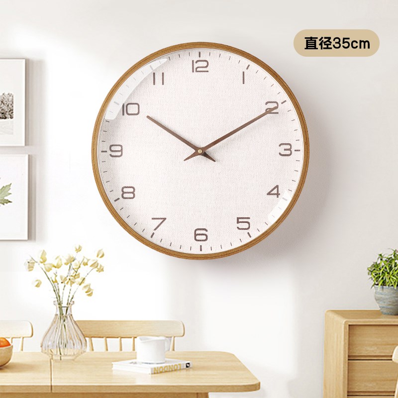 2023新款现代简约实木客厅挂钟家用极简餐厅钟表创意时.尚挂墙时