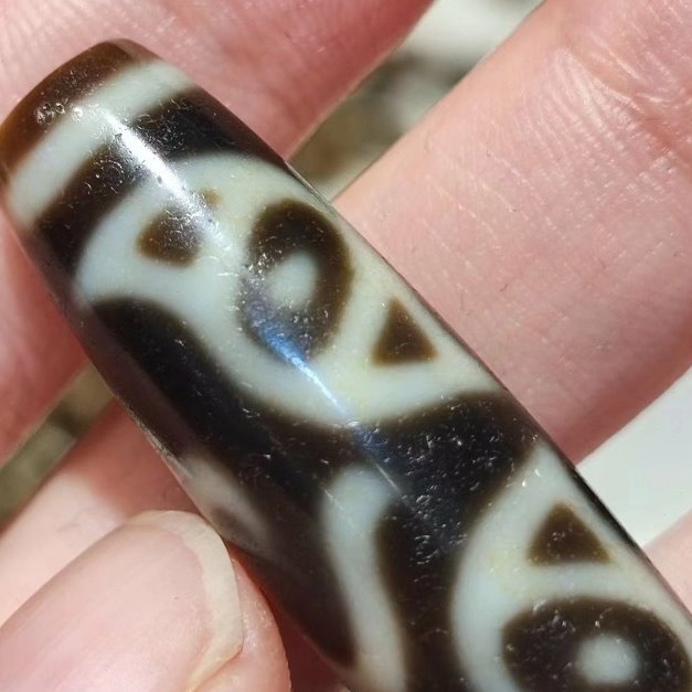 佛眼扎基拉姆的眼睛玛瑙天珠高油风化包浆白芯孔少有图案收藏品
